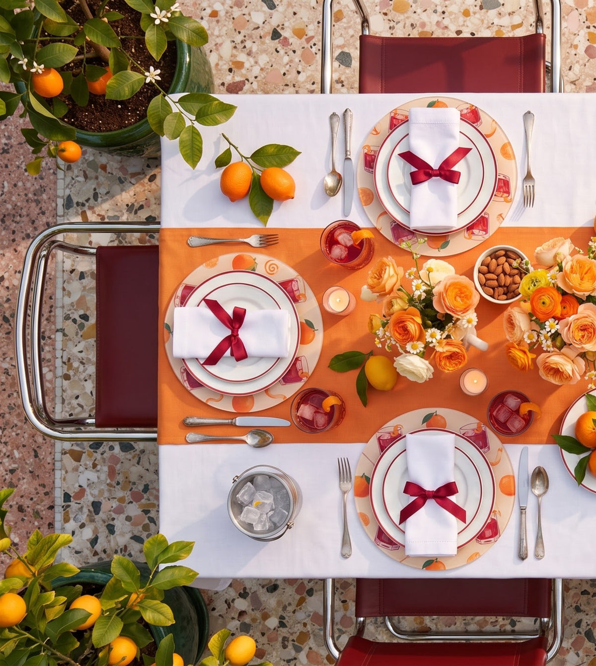 Campari Red Cocktail placemats on a laid table, seen from above