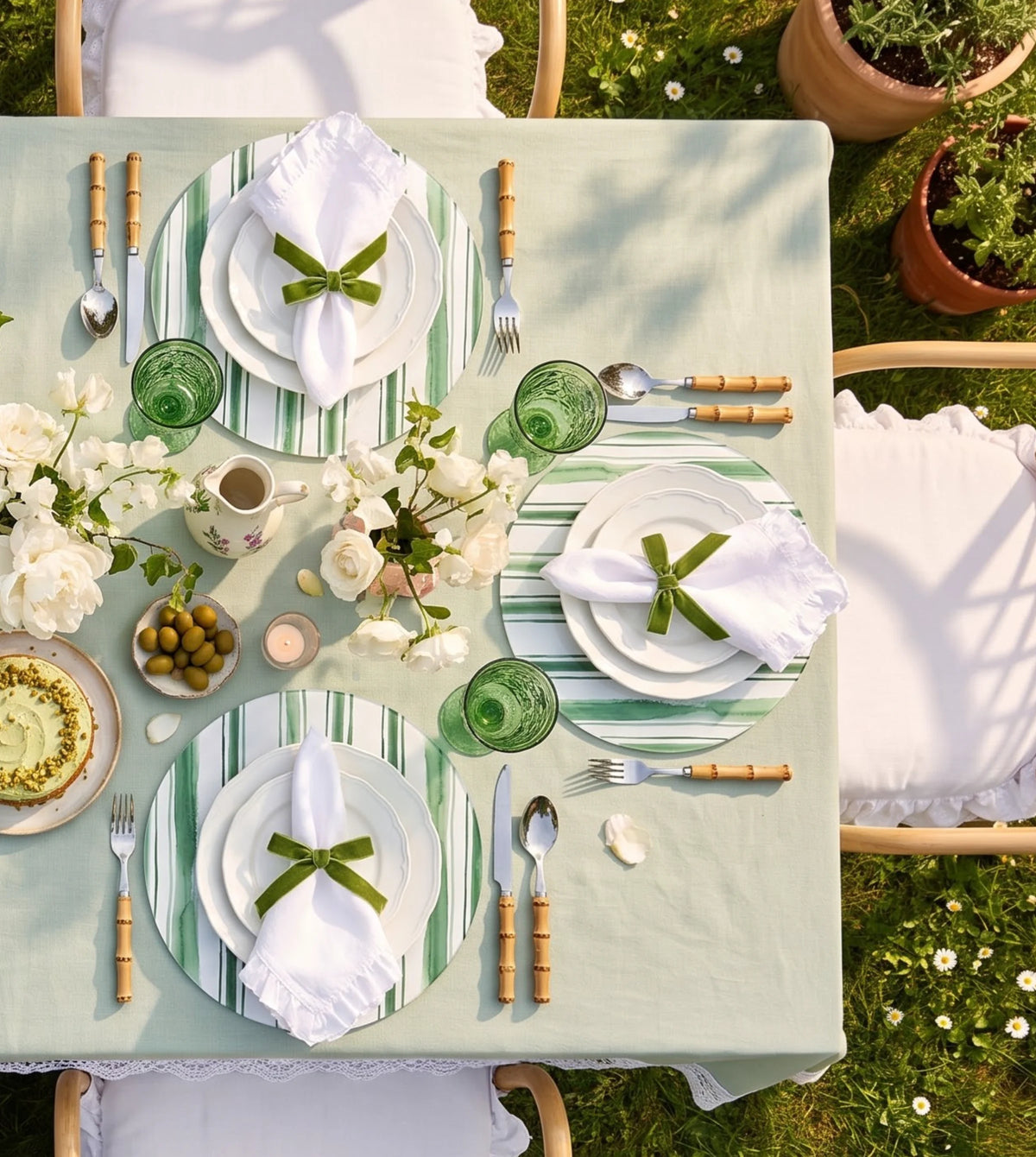 Garden Green Striped round placemats, set of six on a table