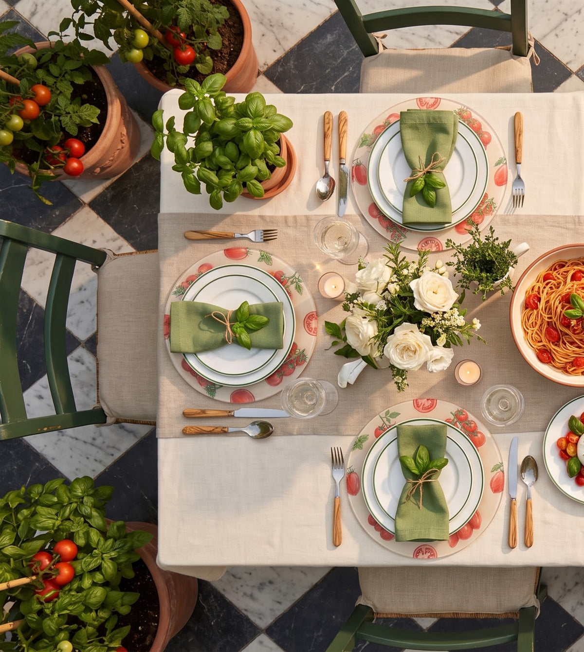 Tomato placemats on a laid table, seen from above