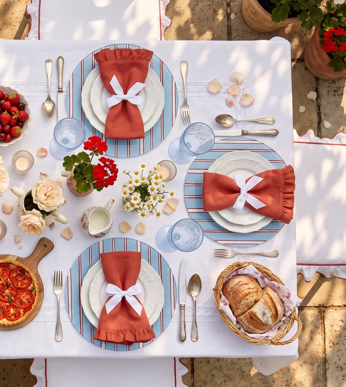 Sienna Blue Cabana Stripe round placemats, set of six on a table