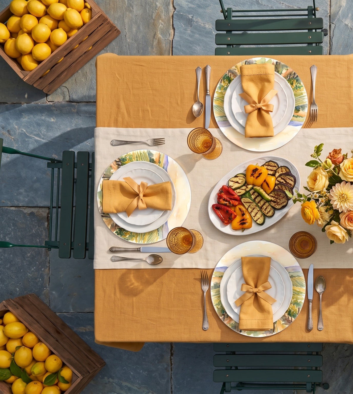 Vineyard placemats on a laid table, seen from above